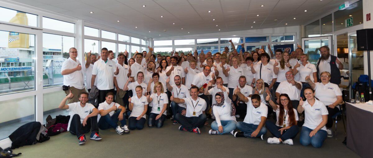 Group photo of employees on a company outing